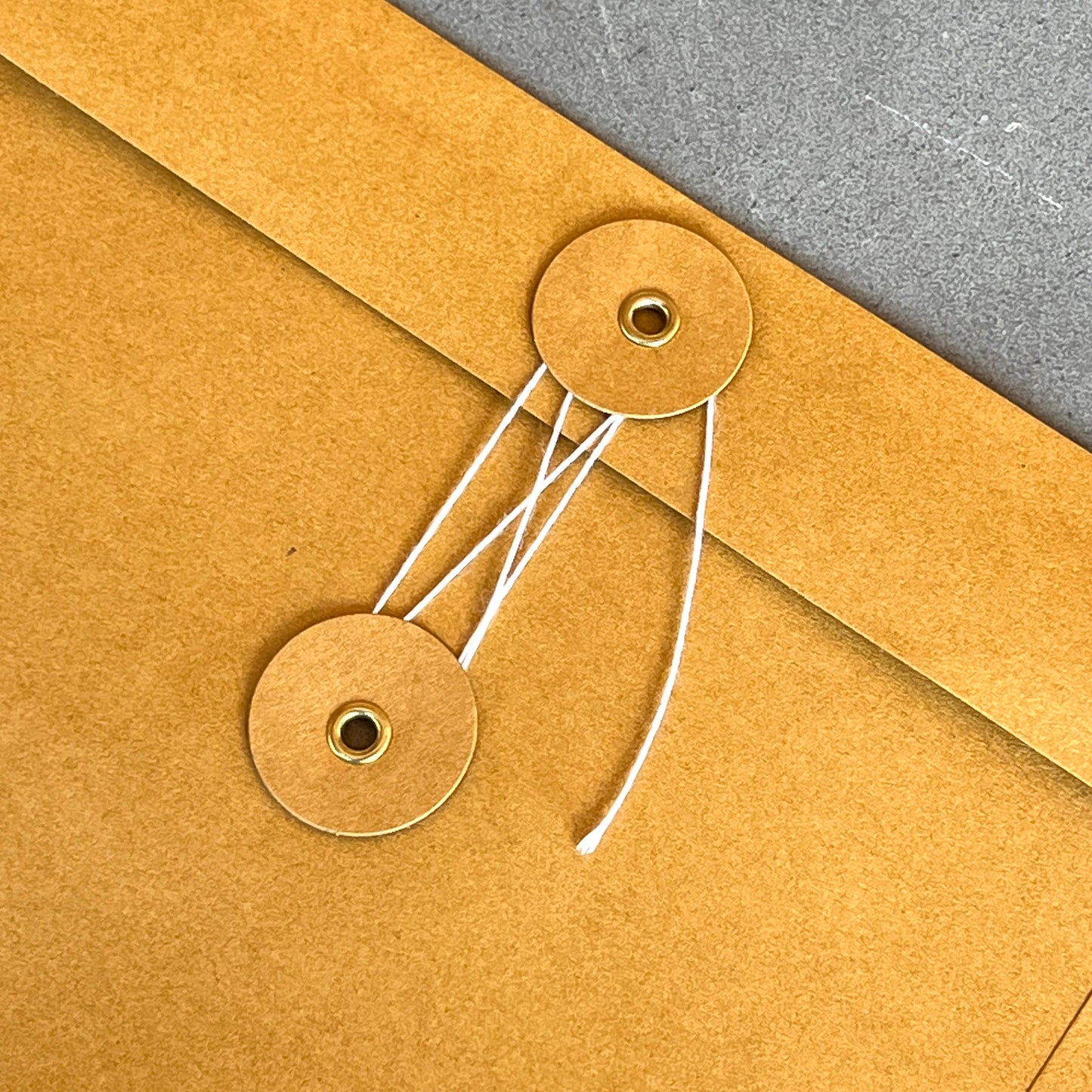 Thai orange string bound envelope